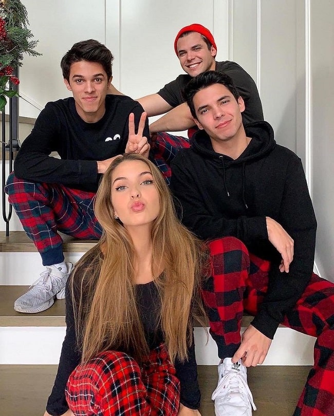 Lexi Rivera with her three brothers