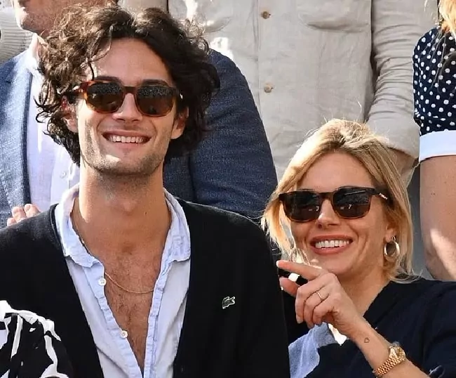 Oli Green and his girlfriend Sienna Miller at the Men's Singles Final at the French Open in Paris